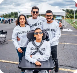 A group of people wearing Cure FA jumpers